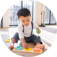 Child playing with Lovevery toys