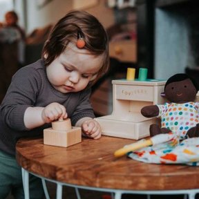 Child playing with Lovevery toys