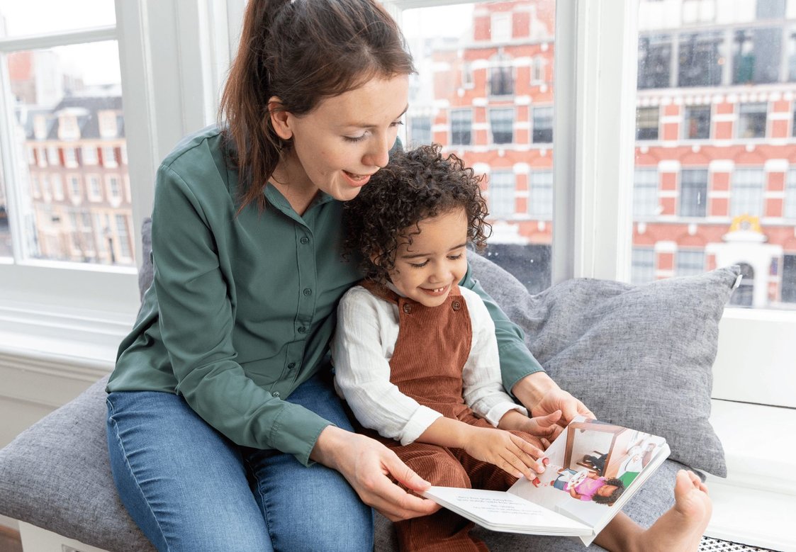 Mother and daughter reading a book