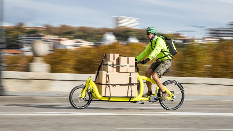 From Transport to Urban Logistics