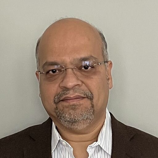 Profile photograph of Madhu Madhavan