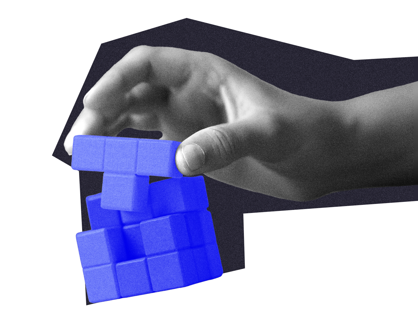 A hand sets blocks in a stack