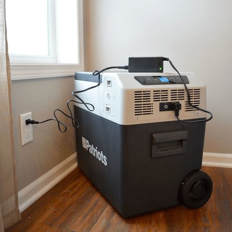 4Patriots Solar Go-Fridge plugged into an outlet inside a home