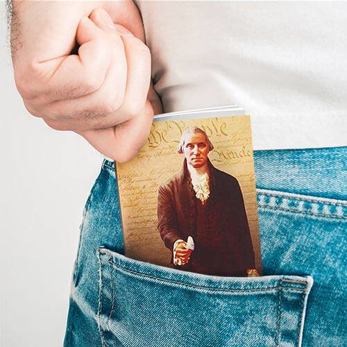 United States Pocket Constitution in a persons back pocket