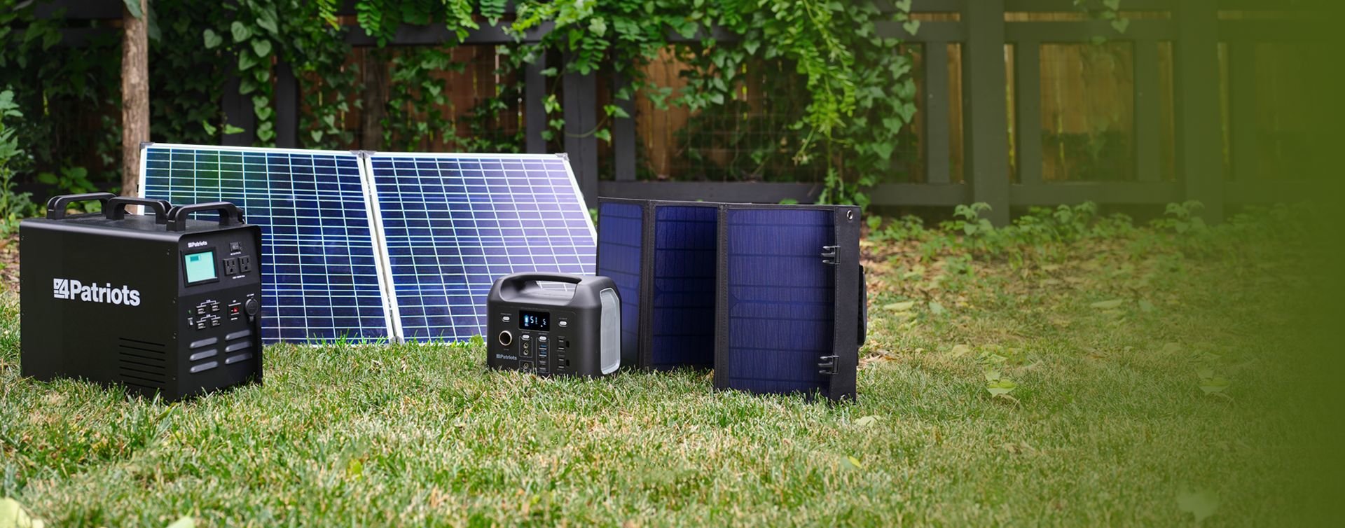 Patriot Power Generator 1800, Patriot Power Sidekick, 100-watt solar panel, and 40-watt solar panel setup in a backyard.