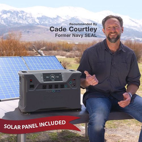 Cade sitting outside with the Patriot Power Generator 2000X and solar panel in behind him.