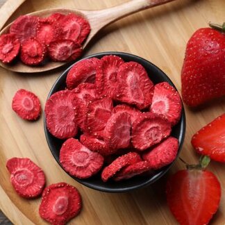 Freeze dried strawberries from the 4Patriots Fruit, Veggie, & Snack emergency survival kit in a bowl ready to be snacked on.
