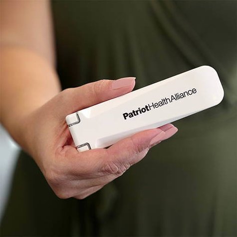 Person holding the Patriot Pure UV Wand