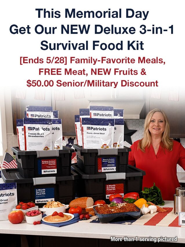 A woman standing in her kitchen with 4 totes of survival food for 4Patriots Memorial Day Offer