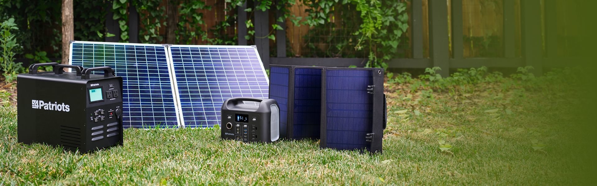 Patriot Power Generator 1800, Patriot Power Sidekick, 100-watt solar panel, and 40-watt solar panel setup in a backyard.