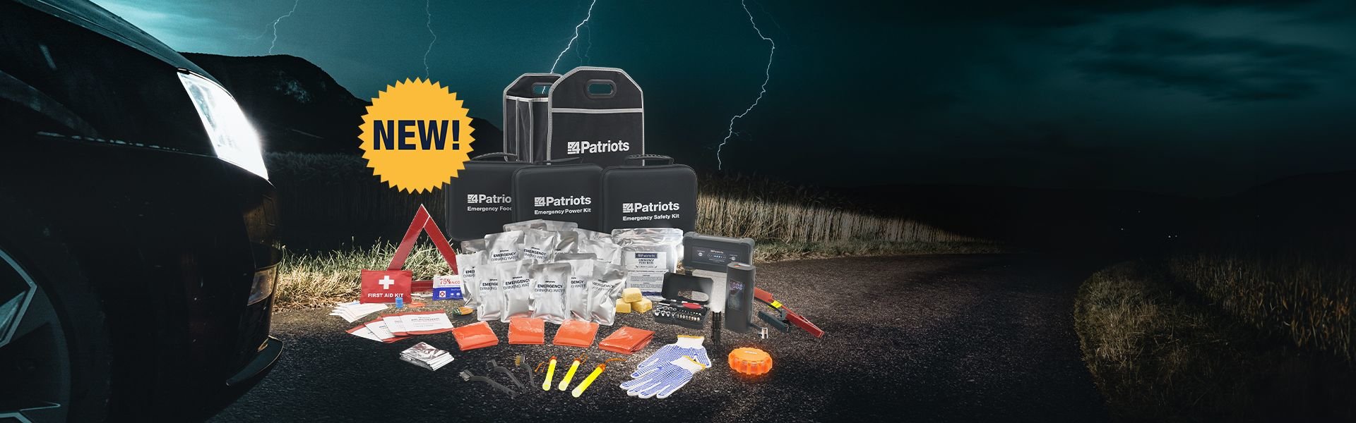 Emergency Car Kit sitting on a road by a car at night during a storm