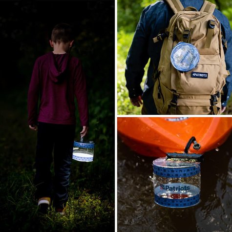 SoLantern Air Inflatable Solar Lantern & Charger shown with the light on, easily carried on your backpack and in the water.