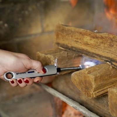 4Patriots Freedom Flame Flexible Arc Lighter being used on wood
