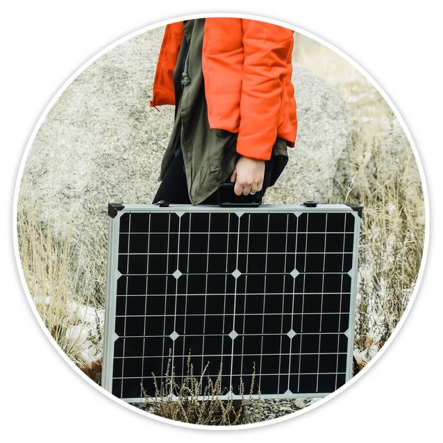 100-watt solar panel folded up being carried