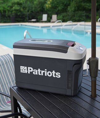 4Patriots Freedom Fridge next to a pool keeping food & drinks cold.
