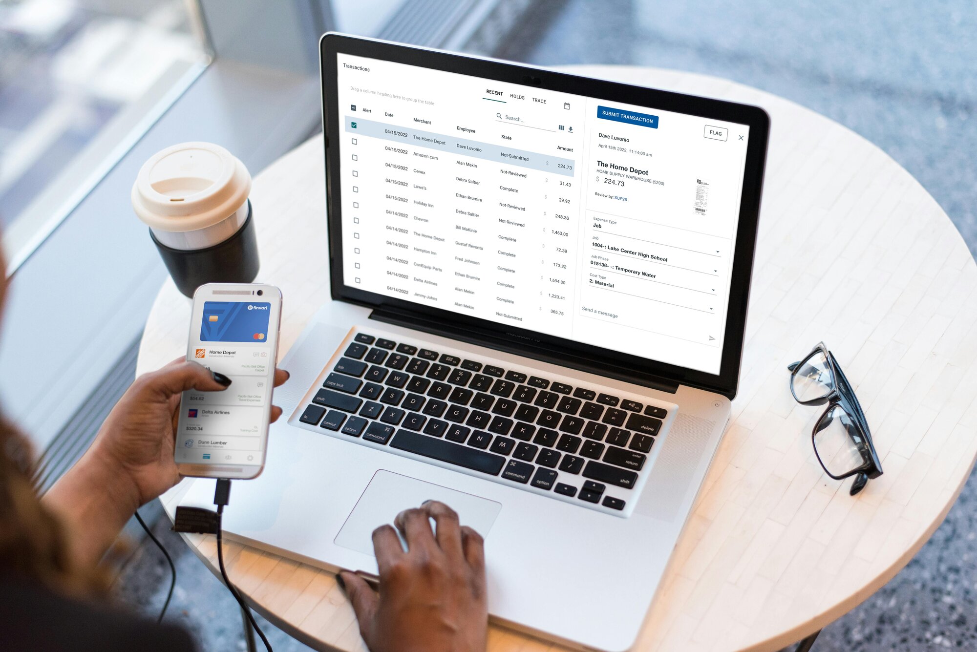 Image of someone using the Finvari app on their phone and desktop computer.