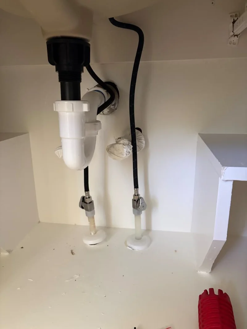 Water heater and plumbing installation