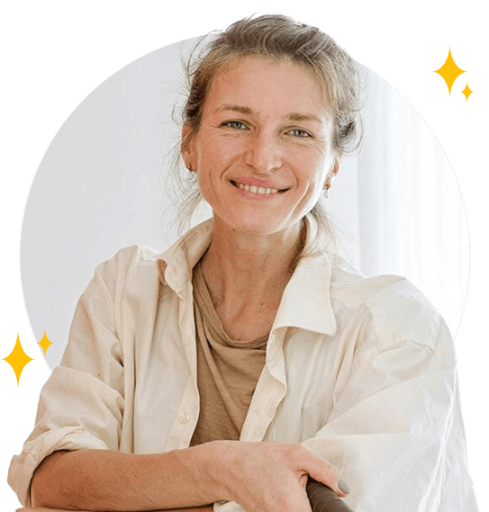 Smiling woman on ladder with paint roller