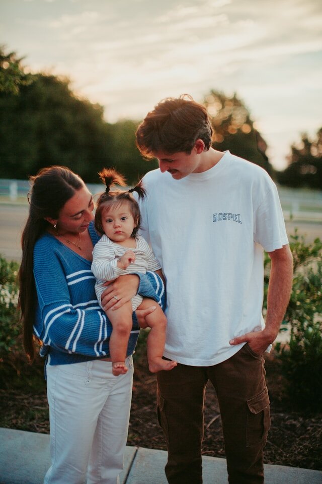 Young couple with a baby.