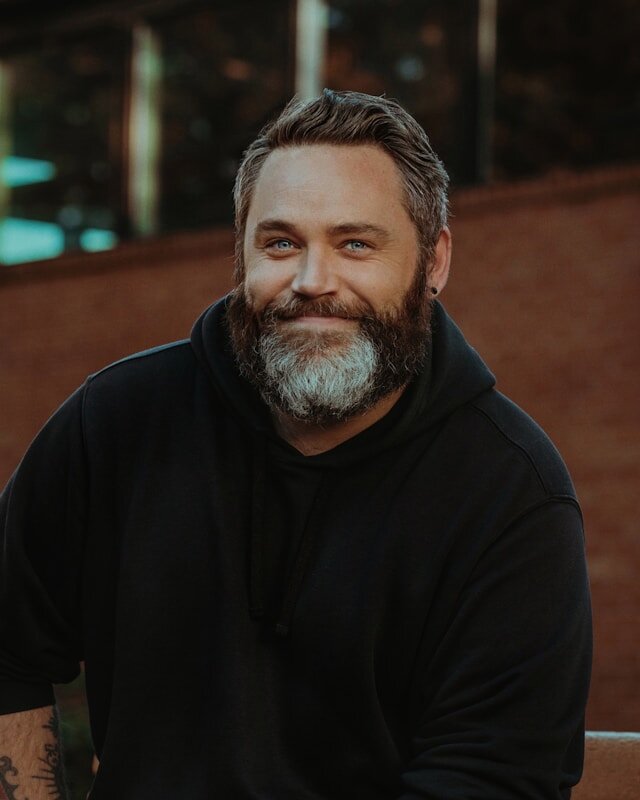 Bearded man smiling