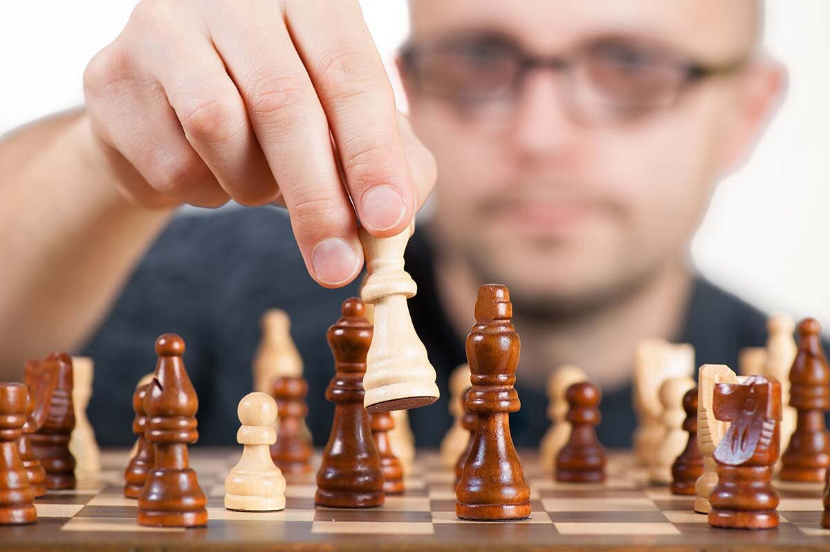 A man playing chess 