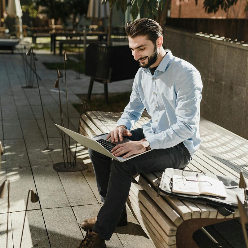  Male entrepreneur working on his laptop