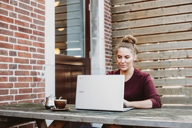 Woman applying for a loan from a laptop