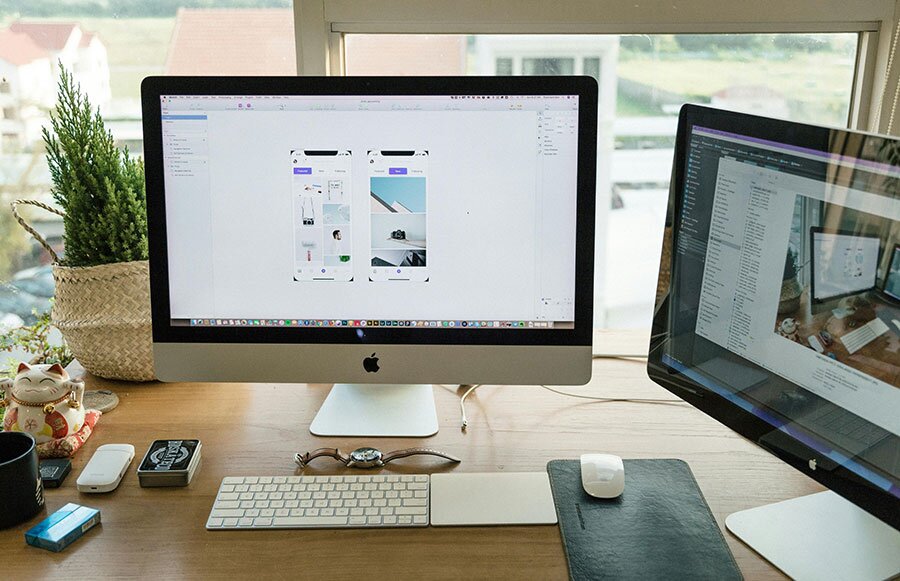 Mac computer display showing website design.