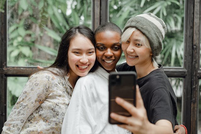 Three young women taking a selfie