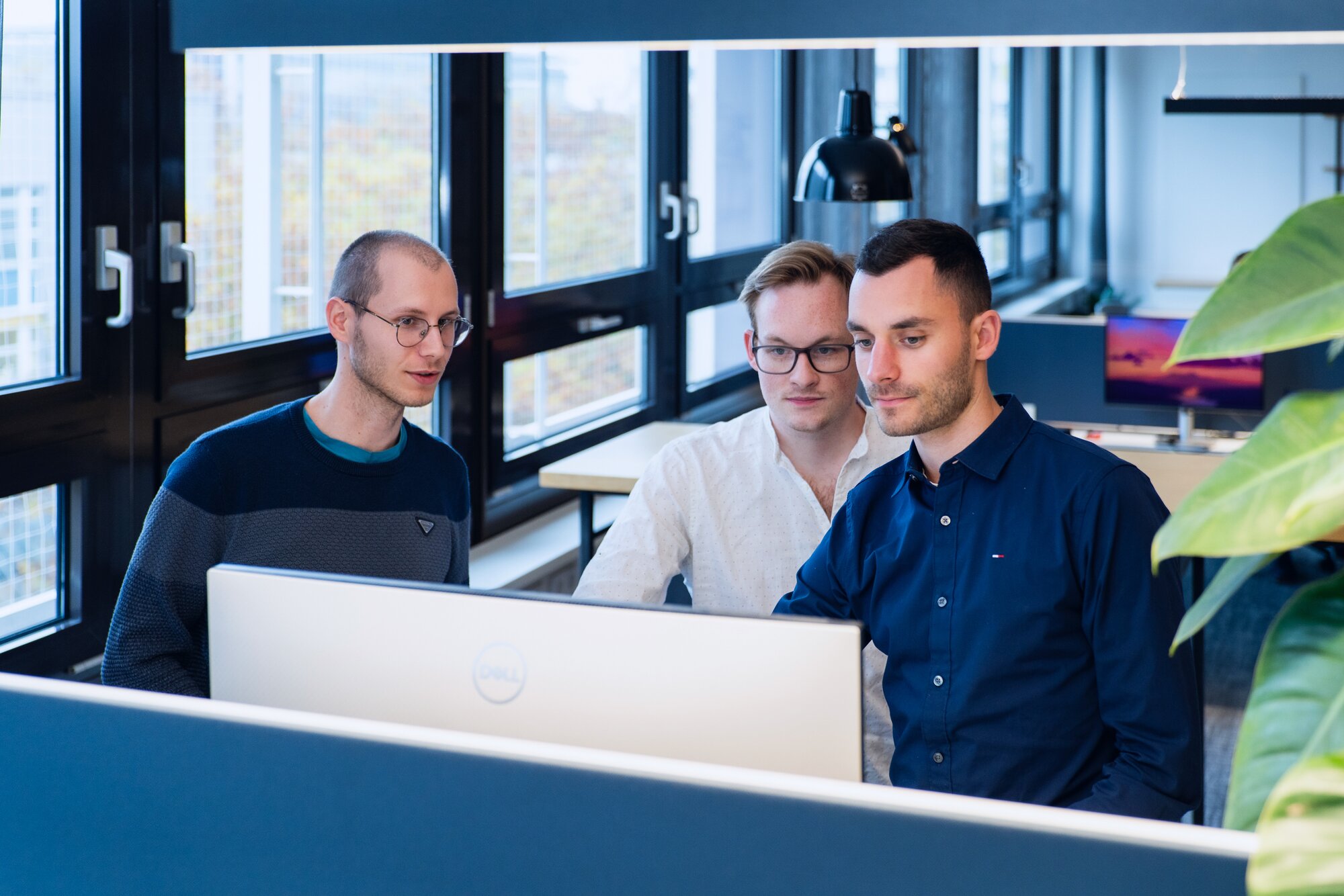 Group of people on a computer