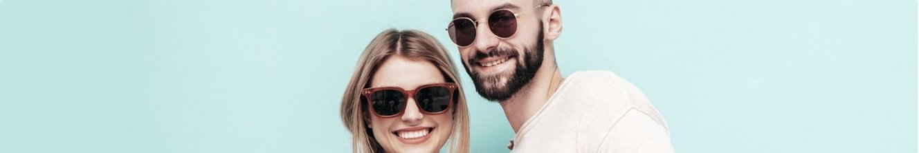 man and a woman wearing sunglasses