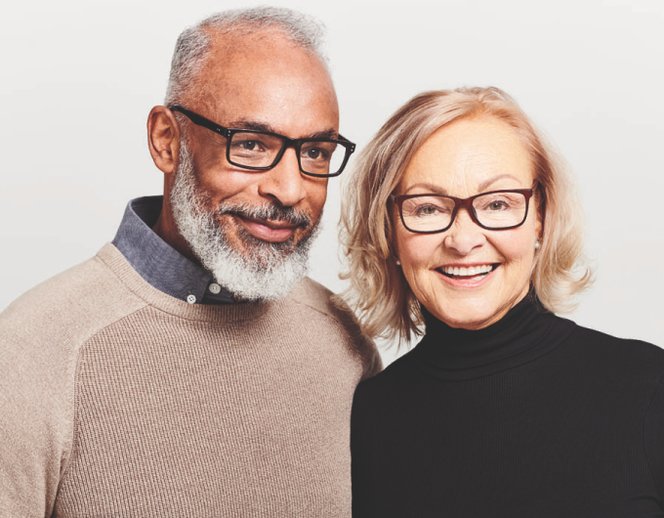 mature man and woman wearing glasses