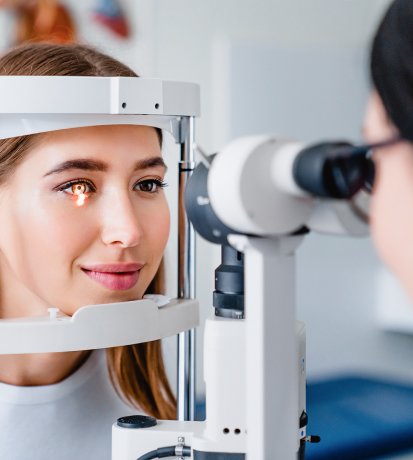 A patient having vision and eye health checks during an eye test