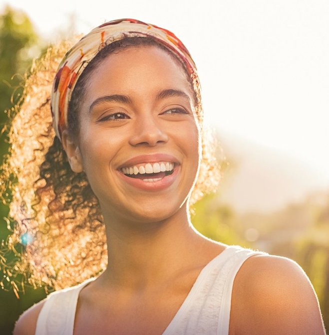 a young woman feeling happy