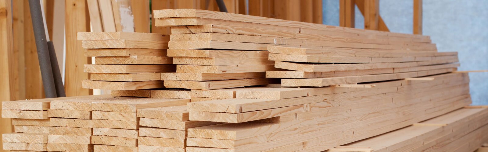 A large stack of dimensional lumber. 