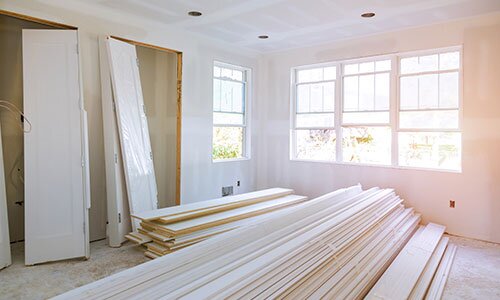 Supplies for reno in a room under construction.