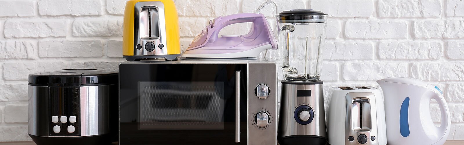 A group of small appliances gathered together.