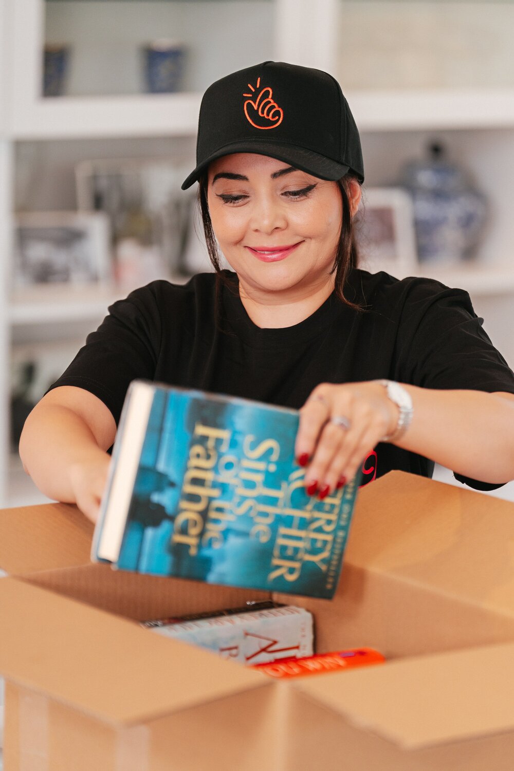 Inside a correctly packed book box with books spine down and gaps filled with paper