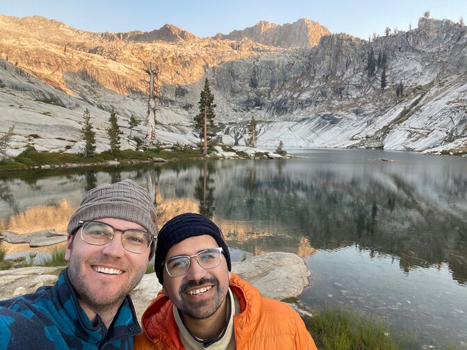 Lawrence and Alejandro on their California honeymoon backpacking trip, enjoying the view—and the comfort of homemade, electric-cooked dehydrated meals.