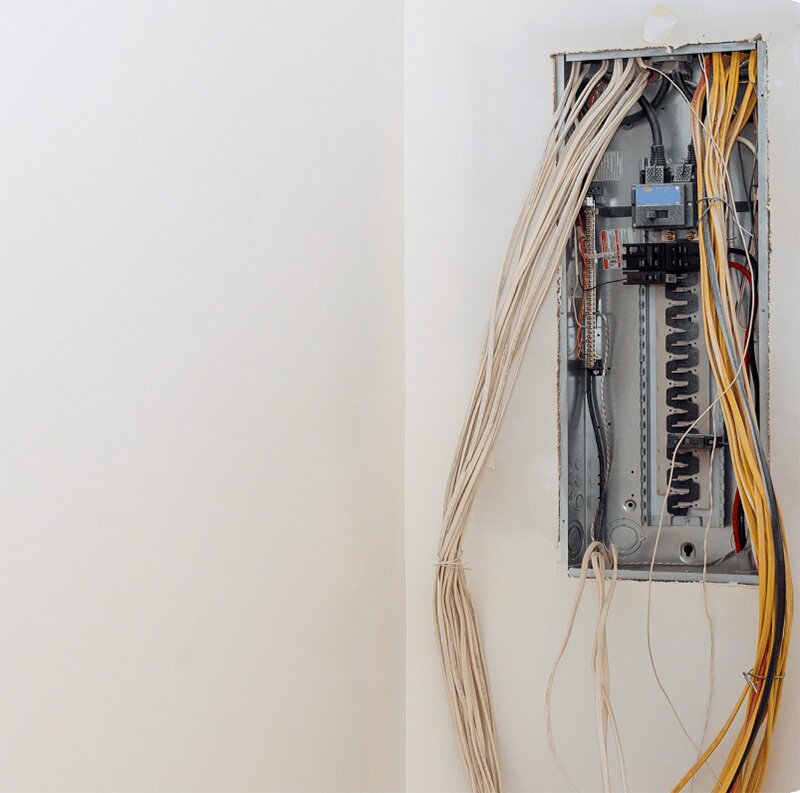 Wall electric panels exposed during installation