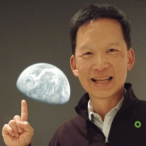 Wei-Tai Kwok  pointing at earth projection