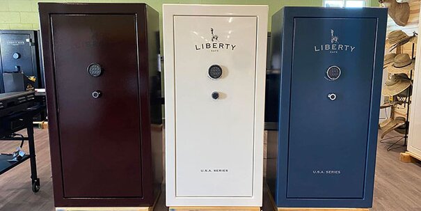 Three Liberty Safes are displayed at HomeTown Solutions. 