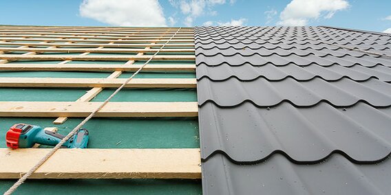 Metal cladding is being installed.