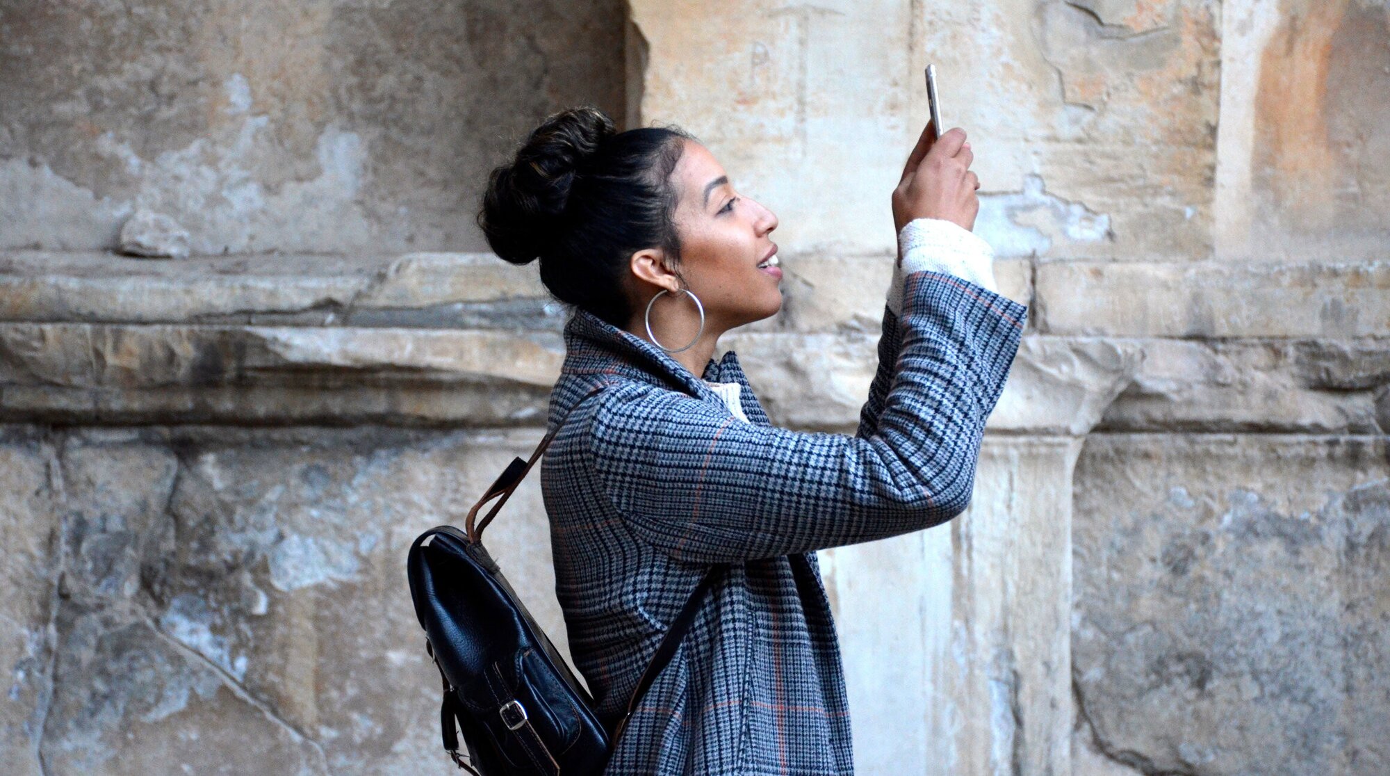 girl looking for a wi-fi signal
