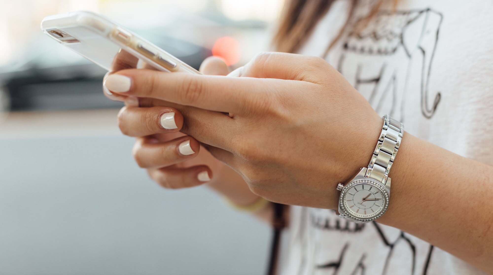 woman texting on a smartphone
