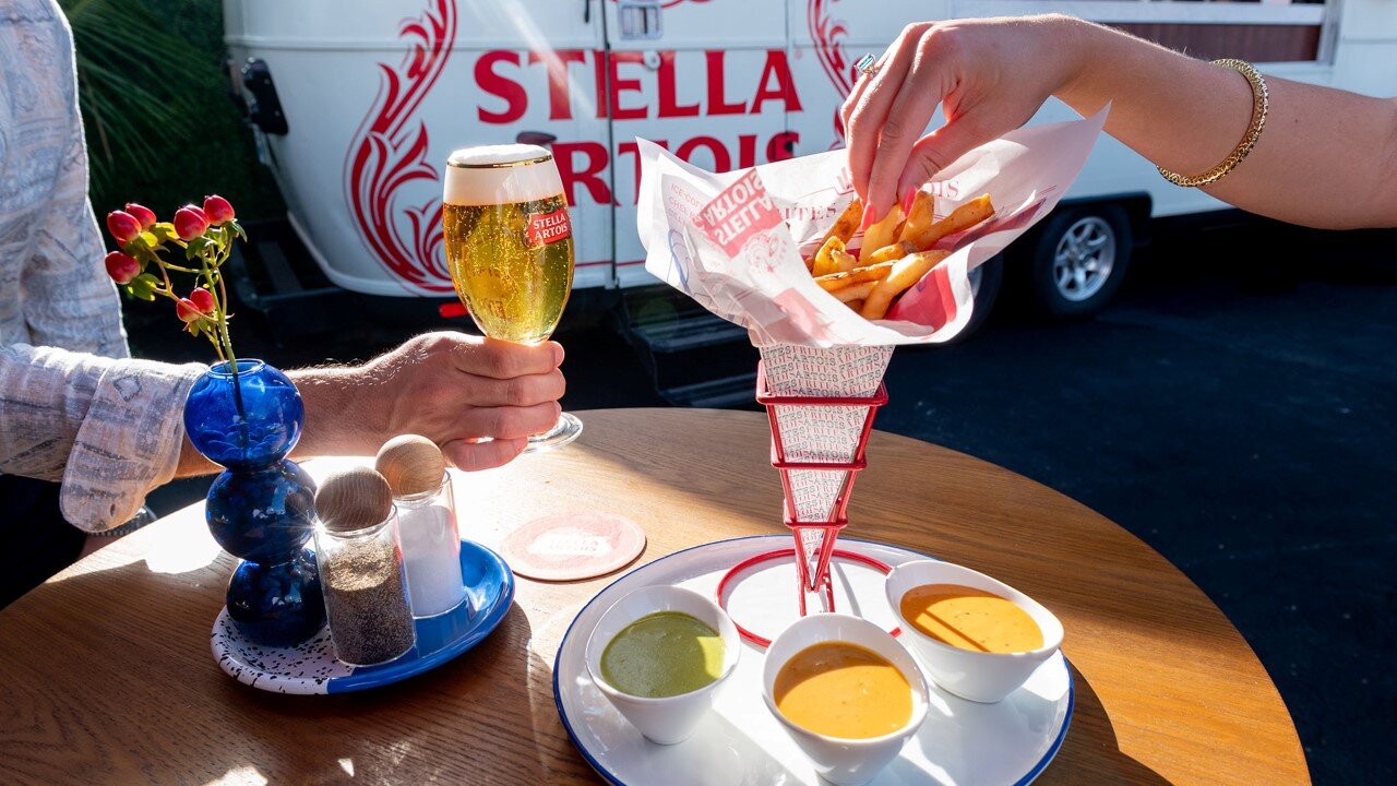 Stella Artois beer with fries and
        dips