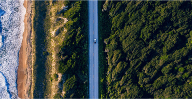 Car on a coastal highway