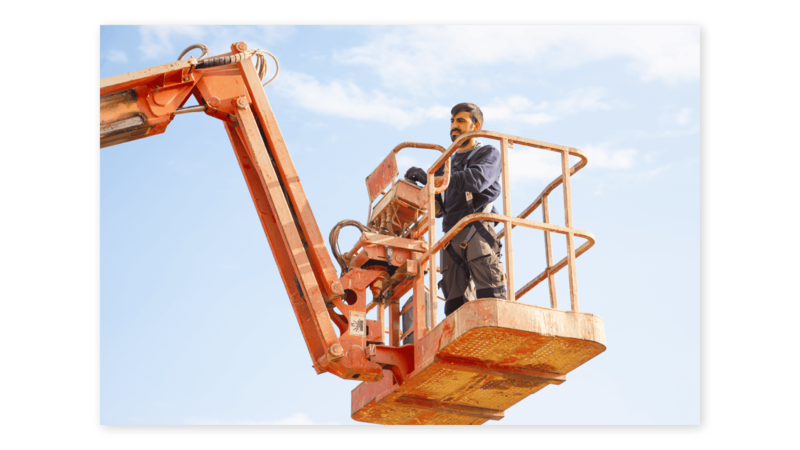 Man operating an aerial lift
