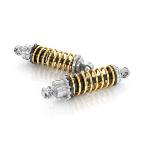 A pair of silver shock absorbers with yellow springs around them