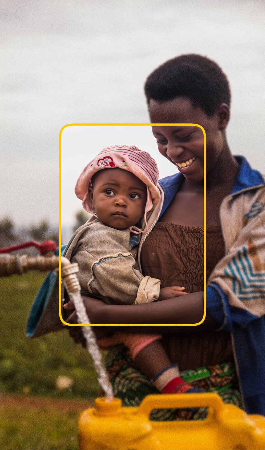 African woman and child filling a jerry can with clean, safe water from a tap